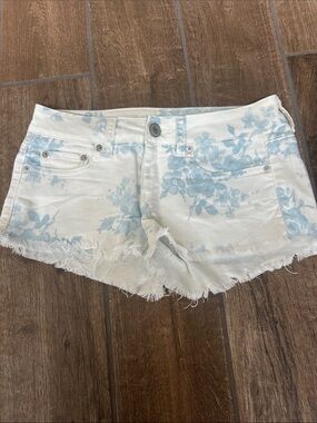 American Eagle Outfitters White Denim Floral Cutoff Shorts with Light Blue Print